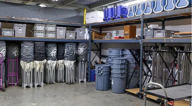 Bonner's warehouse with organized racks of event equipment